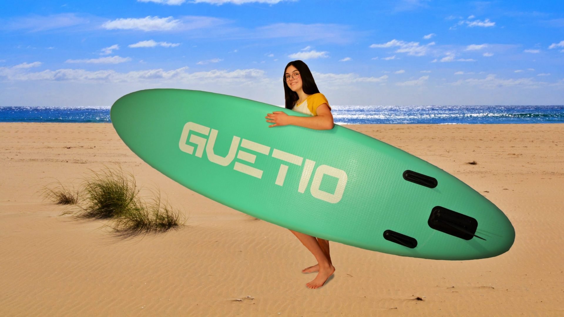 Paddle board on the beach, back side